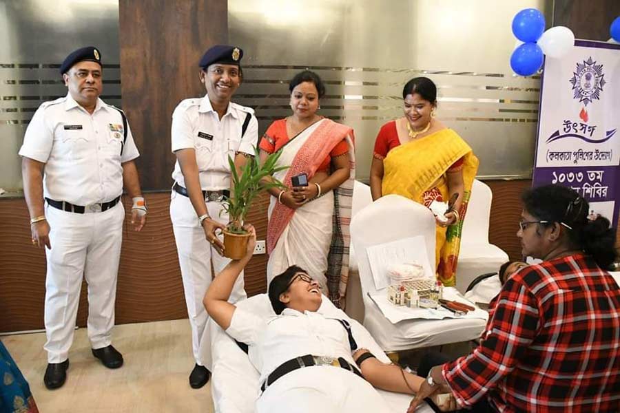 Police personnel participate in blood donation camps at Shakespeare Sarani police station and Tiljala traffic guard on Saturday. As many as 58 police personnel from  Shakespeare Sarani police station and 60 police personnel from Tiljala traffic guard have donated blood at the event.