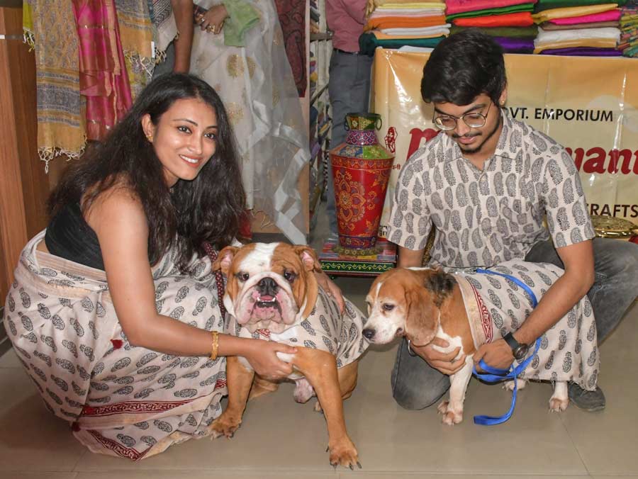 Pet parents twin with their four-legged children at Mrignayani, the Madhya Pradesh government emporium, in Dakshinapan. So, you can now buy new Puja clothes for your pets too!