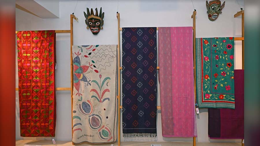 A pre-Independence kantha quilt (second from left) and kantha work from Murshidabad