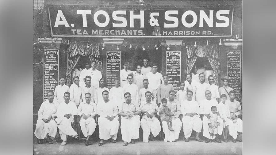 The founder of A. Tosh with family members and employees