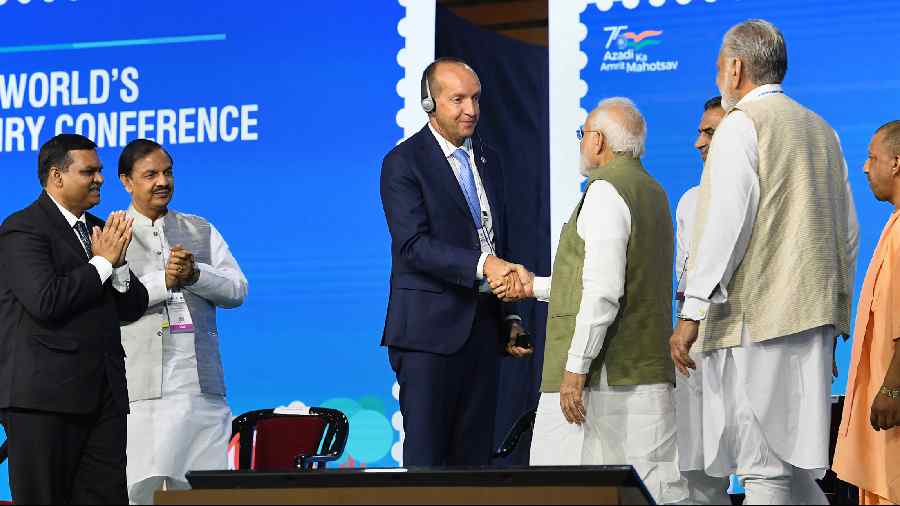 Prime Minister Narendra Modi greets International Dairy Federation President Piercristiano Brazzale at India Expo Centre & Mart in Greater Noida.