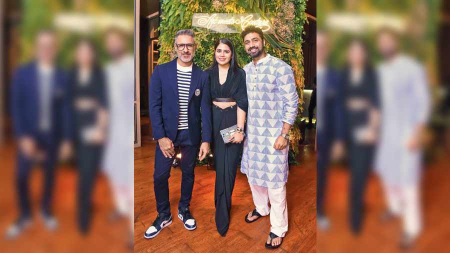(L-R) Nikhil Mehra, Chikky Goenka and Dev at the September 1 pre-party of Art Meets Couture presented by Styleograph and curated by Chikky Goenka that brought to town Shantnu & Nikhil, Tyaani by Karan Johar and Rimzim Dadu for a two-day showcase at Kolkata Centre for Creativity, on September 2 and 3. The evening at JW Marriott Kolkata was a cosy bash with a select set. Chikky looked chic in a black ensemble by Shantnu & Nikhil, the touch of gold on her hair adding to the glam. And she was all smiles. “This was the first time we had a pre-party before a sales event. Usually we are all working towards that, but this made us realise how important it is to create real experiences with people. We are getting into the zone of celebration and festivities. So keeping that in mind, this night set the mood for the next two days. So yes, it will surely be a regular affair for events that demand bespoke experiences,” said Chikky.