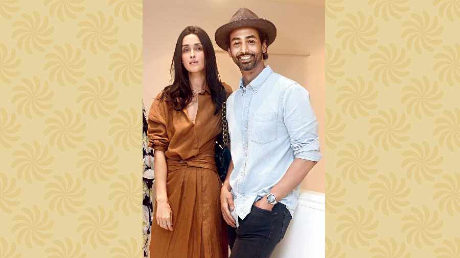 Model-actor Shayan Munshi dropped by with wife Lana. And, what a handsome pair they made. Shayan in his denim-on-denim look and Lana in her chic brown dress.  