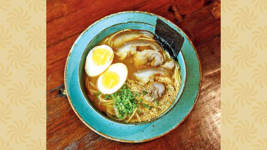 Pork Miso Ramen: It has slow-cooked char siu pork slices with a broth that has been cooked for over 20 hours in slow heat, moved around and stirred... you get all the juices from bones. It is served with a soft-boiled egg. Rs 480-plus