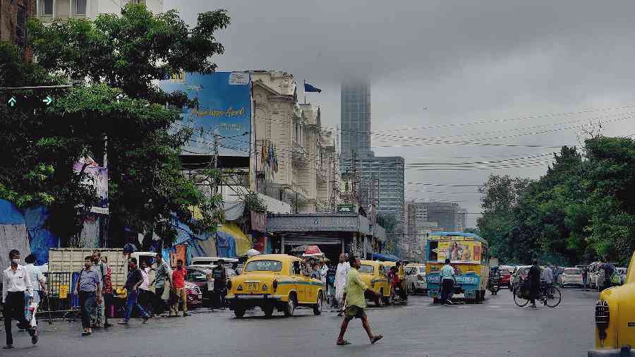 Clouds cover part of the highrise The 42 on JL Nehru Road on Monday afternoon. 