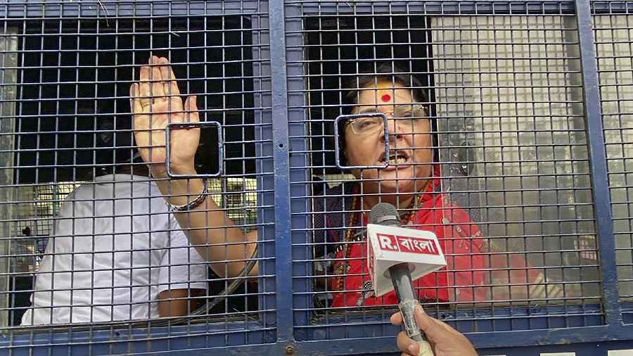 BJP MP Locket Chatterjee being detained by police personnel during the partys Nabanna Abhijan