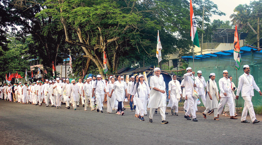 Congress leader Digvijaya Singh and others during the Bharat Jodo Yatra on Kazhakkoottam-Parippally National Highway in Thiruvananthapuram on Tuesday.