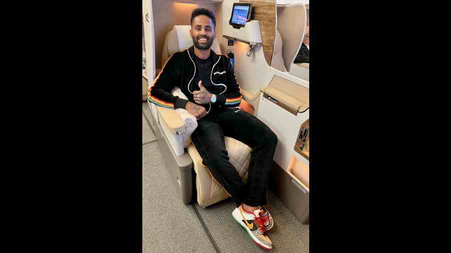 Indian batter strikes a pose on board a flight