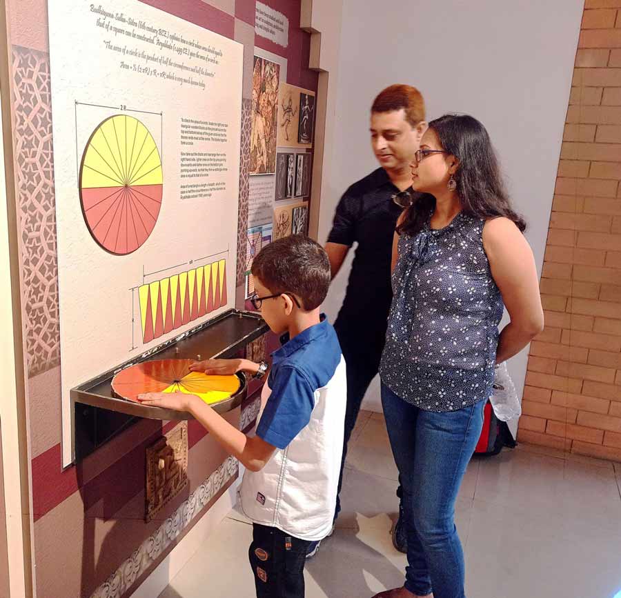 A child looks at a maths exhibit at Science City on Wednesday.