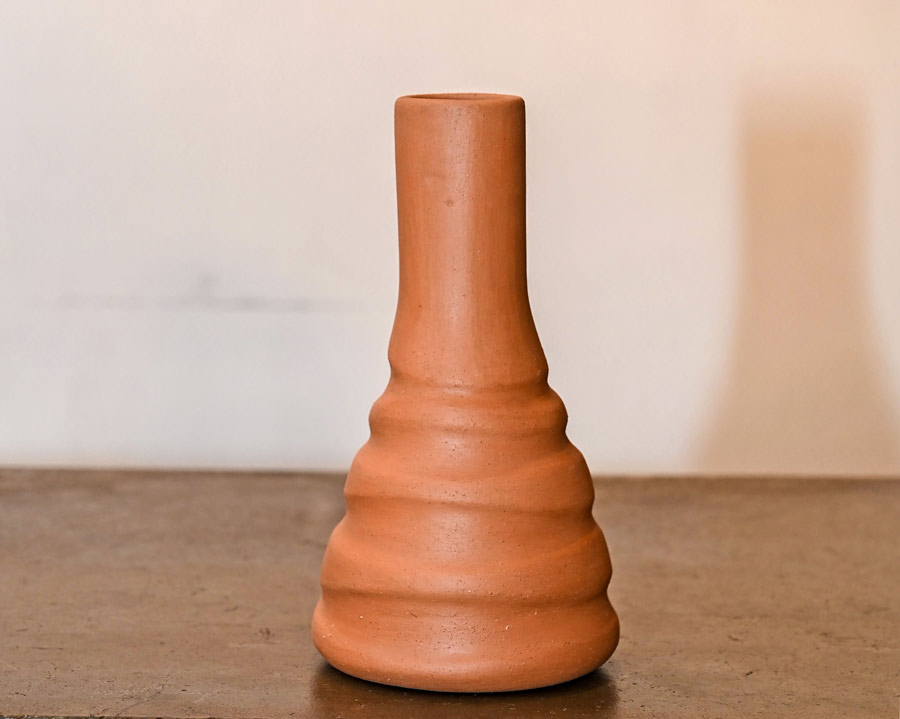 EARTHY ACCENT: There’s something so unpretentious about a simple terracotta vase when it moonlights as the most charming dinner table centrepiece. Just throw in a bunch of fresh flowers, light some candles and you’re all set. Price: Rs 750