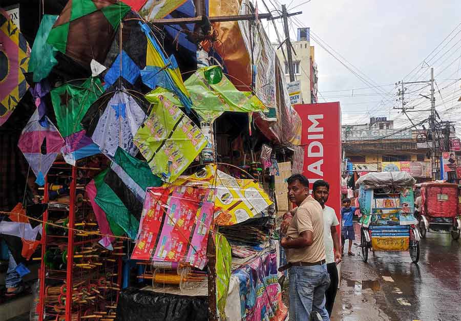 Heavy rain on Friday afternoon damaged kites at a shop in Baguiati area. Rain also played spoilsport for kite sellers.