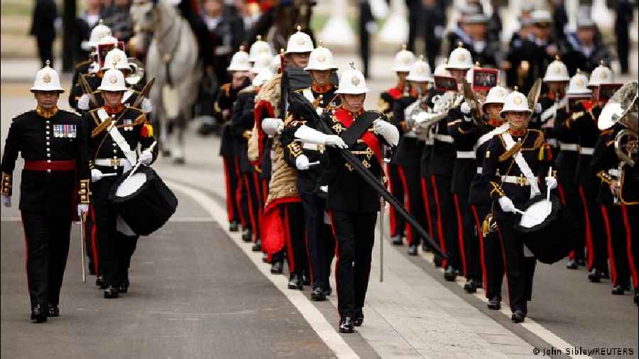 The Royal Marines Band Service are seen at Westminster Abbey