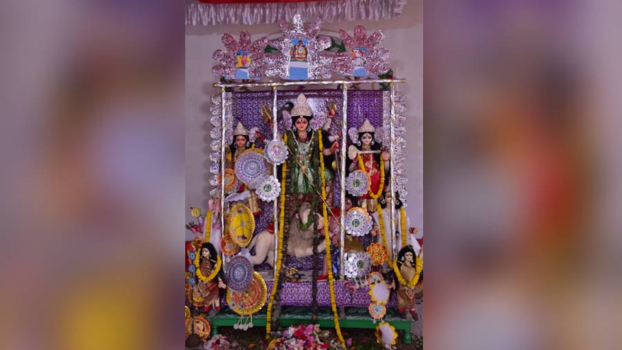 The idol of Goddess Durga and her children at the Mitra family house in Baksa, Serampore