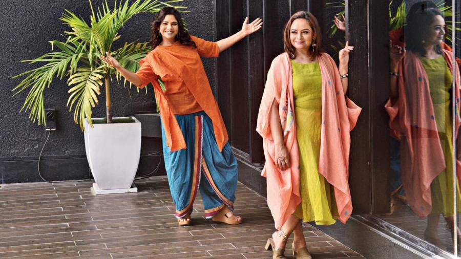 Sisters Sudipta and Bidipta were fun and fuss-free in Indo-western looks. While Sudipta channelled Shah Rukh Khan vibes with opens arm, in a pair of dhoti pants and a colourful top, Bidipta was in a layered look: kaftan jamdani shrug + dress. “You can wear the shrug with various other silhouettes,” said Suchismita.