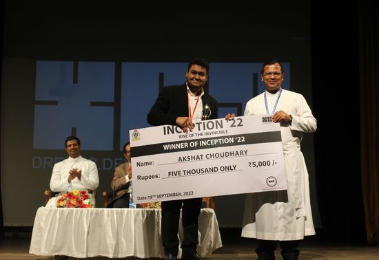 Akshat Choudhary - Winner, Inception 2022 - Felicitated by Rev. Fr. Joseph Kulandai, SJ
