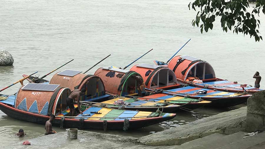 Colourful noukas at Prinsep Ghat await their Hooghly passengers