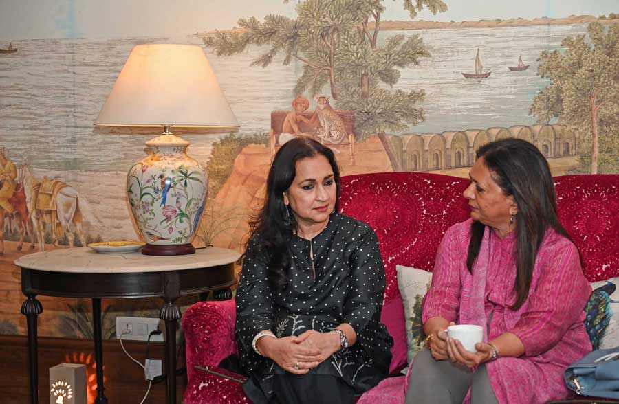 Madhu Neotia and Karuna Singh chat during the high tea
