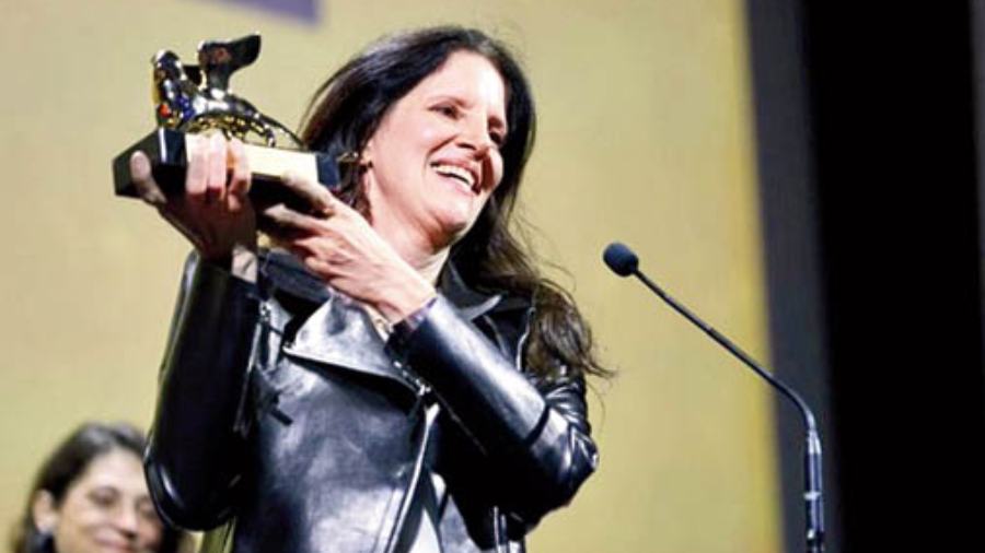 Laura Poitras with the Golden Lion for All the Beauty and Bloodshed