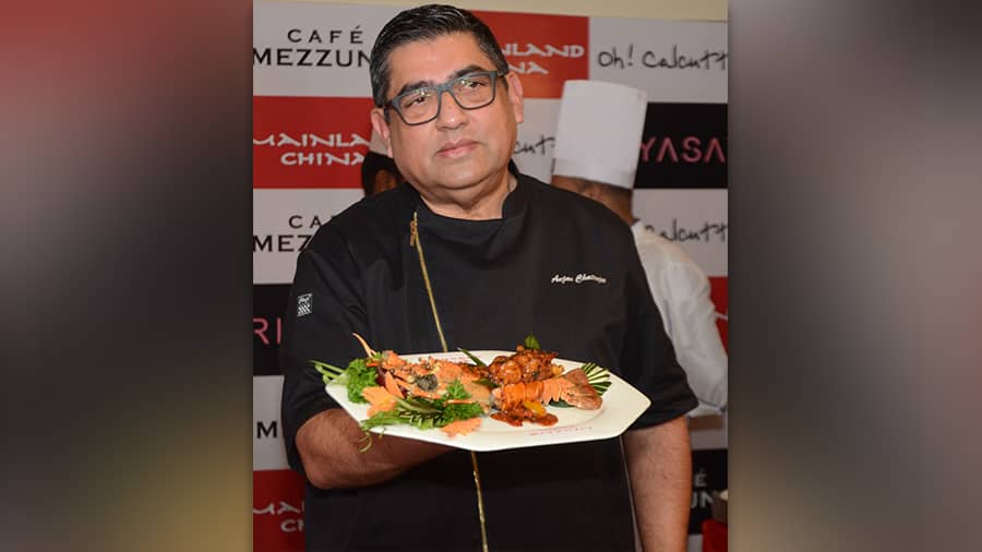 Anjan Chatterjee, founder and managing director of Speciality Restaurants, with a Puja-special dish
