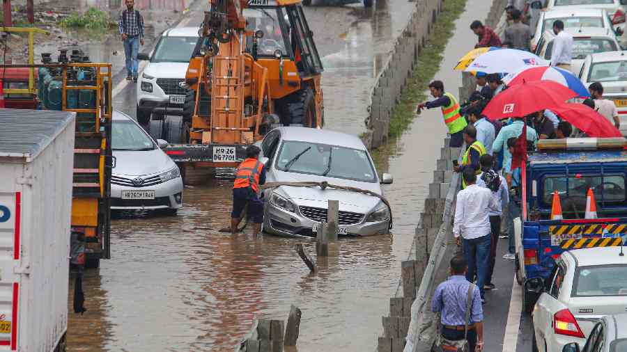 A vehicle stuck on the waterlogged Delhi-Gurugram Expressway service road