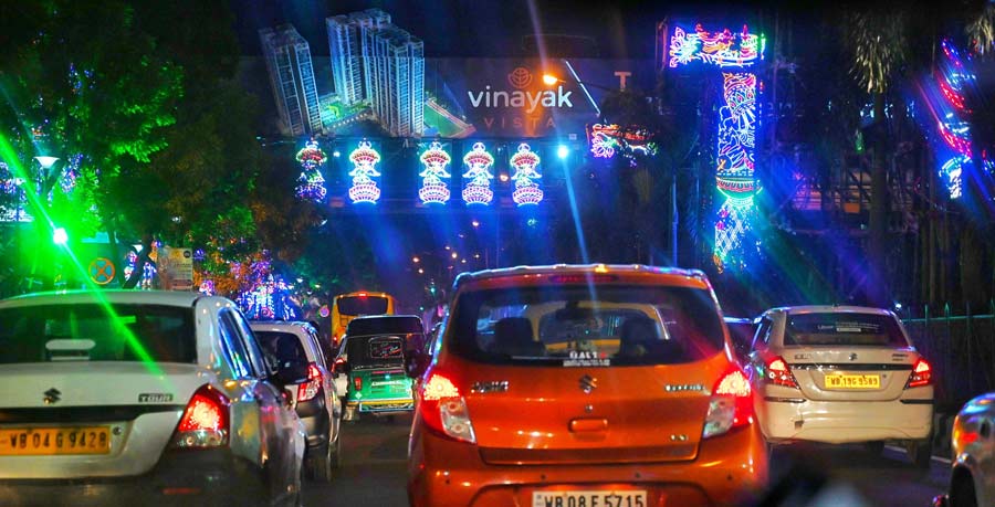 An illuminated VIP road on Friday evening near Sreebhumi puja pandal. Sreebhumi Sporting Club, which enthrals devotees with its theme every year, has designed the pandal on the lines of the 'Vatican City' this year. They are also celebrating the Golden Jubilee Celebration. 