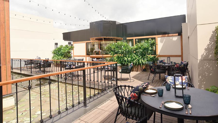 The outside is modelled around the idea of a beer garden with colourful printed cushions lining the chairs and a beer tap bar for the upcoming microbrewery. Big green plants also line this area and add to the garden vibe.