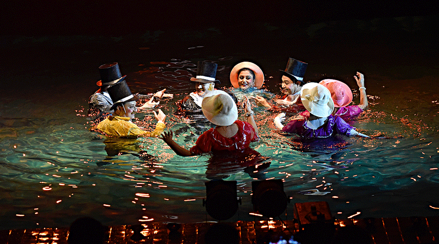 Group of swimmers performed a water ballet at Anderson Club.