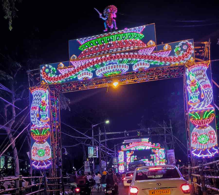 An illuminated VIP road on Saturday, September 24, near Sreebhumi puja pandal. Sreebhumi Sporting Club, which enthrals devotees with its theme every year, has designed the pandal on the lines of the 'Vatican City' this year. They are also celebrating the Golden Jubilee Celebration.