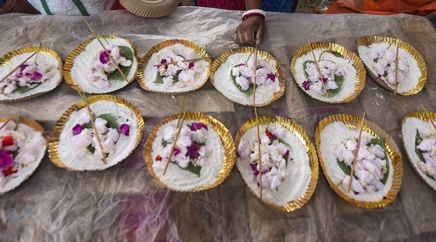 Items meant to be used for tarpan ritual on display for sale at a roadside shop in Calcutta