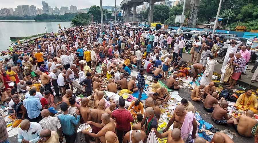 Powai Lake in Mumbai is inundated with devotees