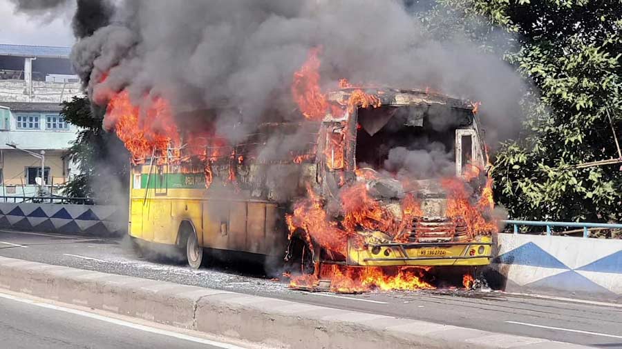 An empty school bus caught fire on Taratala Flyover on Monday around 2pm. 