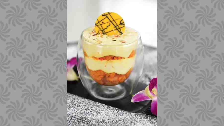 Motichoor Rabdi: A must-try recommendation from The Telegraph. This light and airy dessert brings in the goodness of a light sponge, motichoor balls, saffron yogurt mousse, and fresh dry fruits all in one.