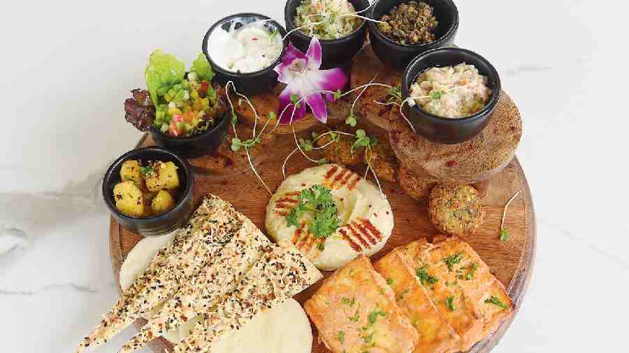 Mezze Platter: This is quite a looker of a sharing platter. Creamy hummus is the star of the plate and all accompaniments such as the pita bread, the lavash and the salad complement it perfectly.