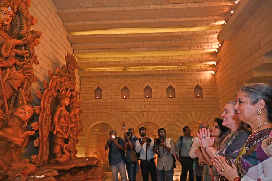 The Manicktalla Chaltabagan Lohapatty Durga Puja pandal was thrown open to visitors on September 27. Rupali Kahlon, wife of major general S.S. Kahlon, GOC, Bengal sub area; Melinda Pavek, consul general of USA in Kolkata; and Sangeeta Sahu, wife of Commodore Rituraj Sahu, naval officer in-charge West Bengal; offer flowers to the deity. “The wait is finally over. We are hoping to welcome more visitors than in the past two pandemic years. We are well-prepared. People have already started visiting the pandal since Mahalaya,” said Suren Khara, general secretary of the puja committee. My Kolkata is the digital partner for the Puja