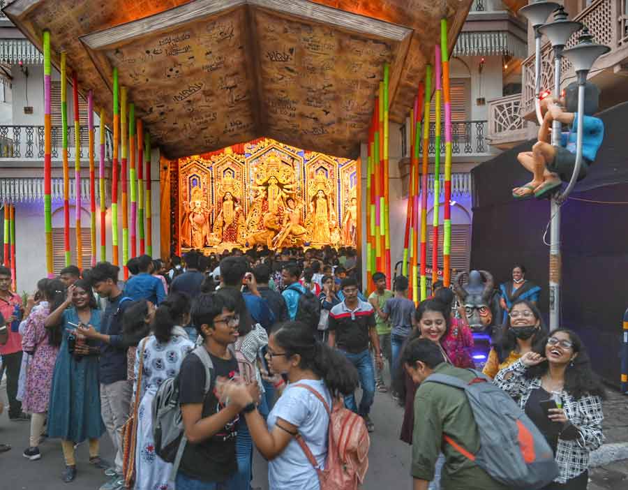Revellers at a south Kolkata puja pandal on Thursday.