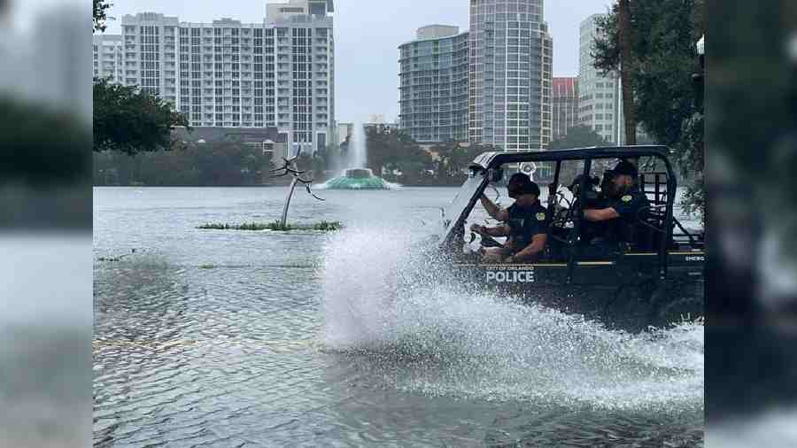 Officers continue to patrol the streets during hazardous conditions in Orlando, Florida.
