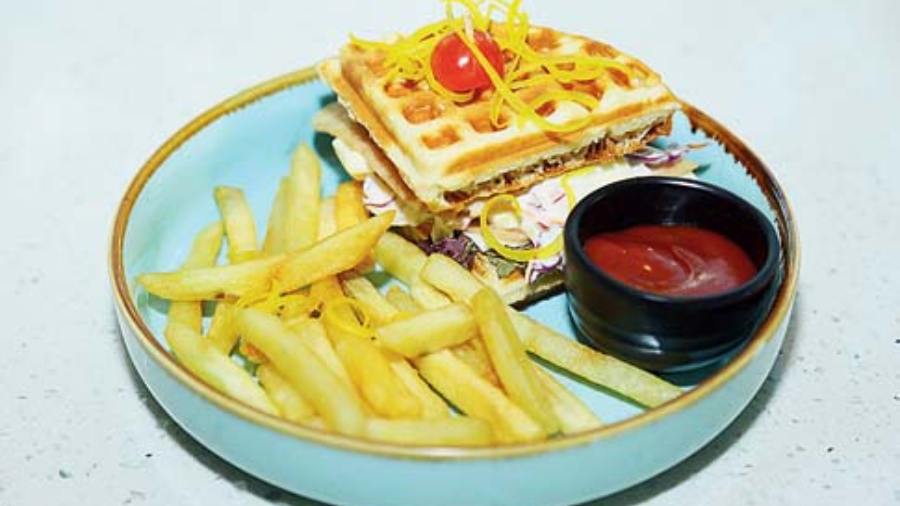 Ham & Cheese Waffle Sandwich: This unique freshly made savoury waffle sandwich is loaded with decks of ham, cheese and veggies that will fill you completely. Bonus? Crispy French Fries on the side. #BingeOn