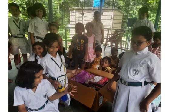 Students at DPS Newtown celebrate Durga Puja by giving gifts to the underprivileged children 