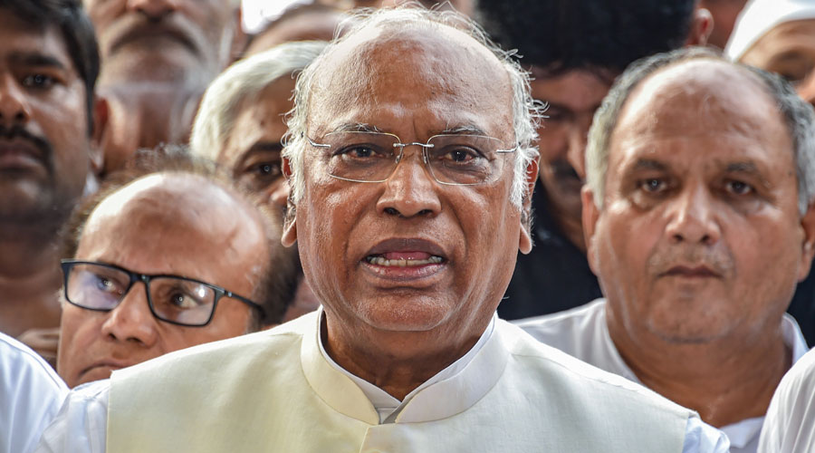 Senior Congress leader Mallikarjun Kharge speaks to the media after filing his nomination papers for the post of party President at AICC headquarters in New Delhi.