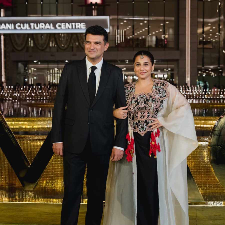 Vidya Balan made a statement in an Anamika Khanna look. Her husband Siddharth Roy Kapur opted for a classic tuxedo. 