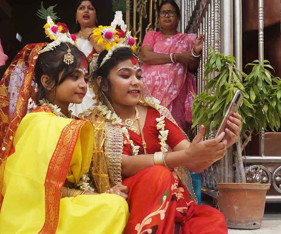  Young girls being worshiped as a part of Kumari puja during Basanti puja at Adyapith on Thursday. Around 2,000 young girls participated in Kumari puja this year 