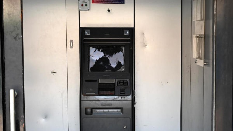 An ATM that was vandalised during the violence at Rishra in Hooghly district on Sunday