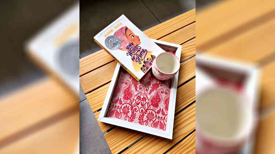 A serving tray with beautiful traditional print is a must-have to create an impression 