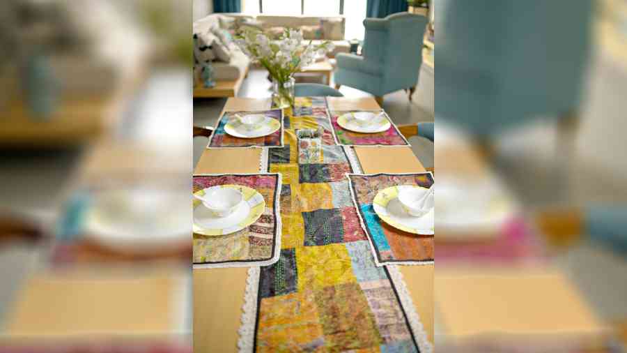 A table runner with kantha detailing will make the Poila Baisakh dinner more special