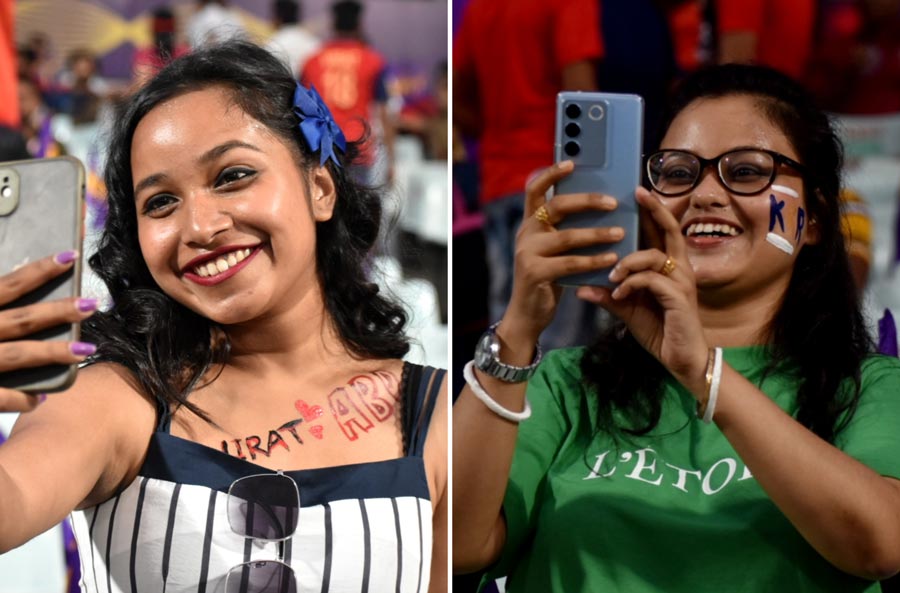 Young fans of RCB and KKR pose for selfies before the match. Who will go home smiling? 