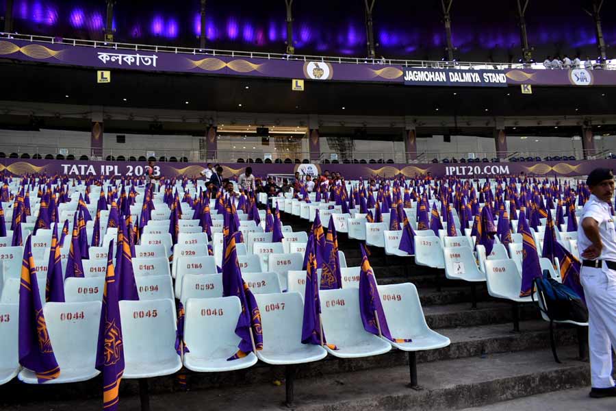 A policeman keeps vigil before the stadium gates are opened