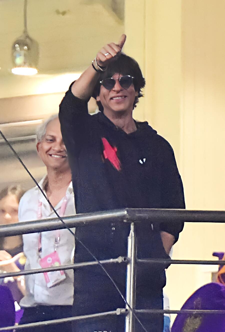 Shah Rukh Khan cheers for KKR during the match against RCB at the Eden Gardens on Friday. The Knights recorded their first victory this season, winning the match by 81 runs. KKR co-owner Juhi Chawla was also present