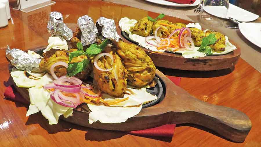 Kebabs served on sizzler platter.