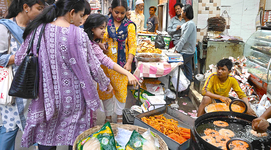 The students on Zakaria Street, dotted with stalls selling iftar delicacies.