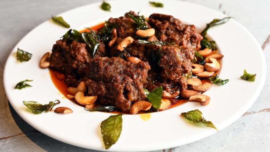 Ghee Roast Mutton: A musttry on the menu, this mutton recipe has juicy and succulent mutton pieces cooked in Mangalore-style coconut and curry leaf gravy that is simply irresistible.